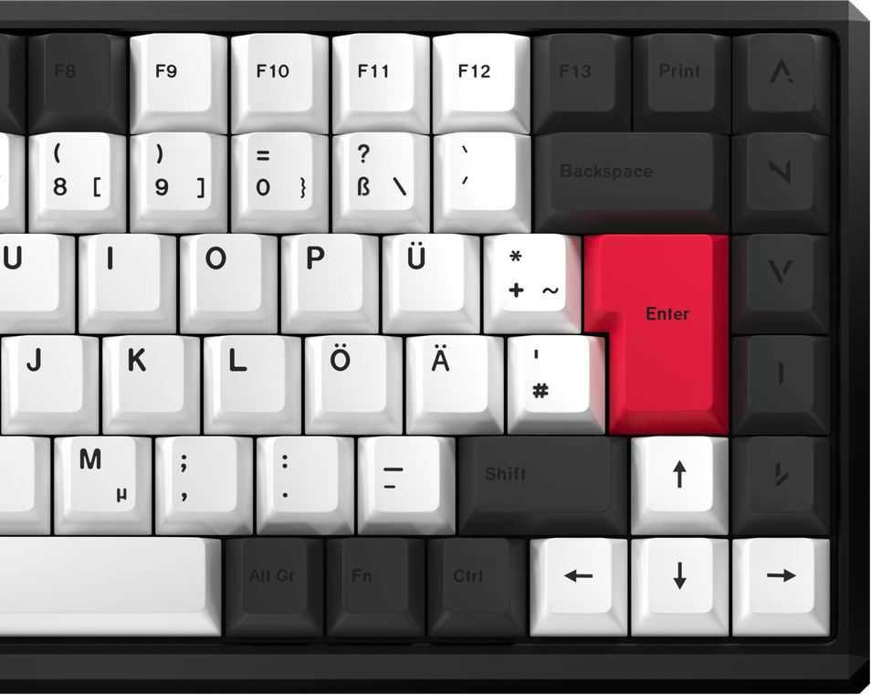 Ausschnitt der NATIVE 75 in Schwarz mit weißen Keycaps, roter Enter-Taste und Umlauten